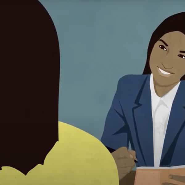 Two women discussing new business plan
